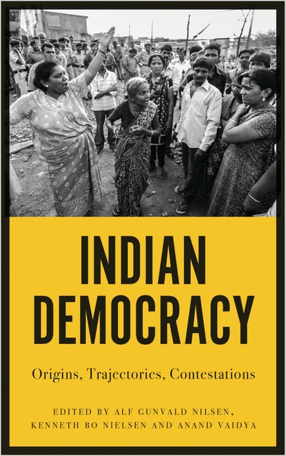 Front page of a magazine. It says: Indian Democracy. Illustration.