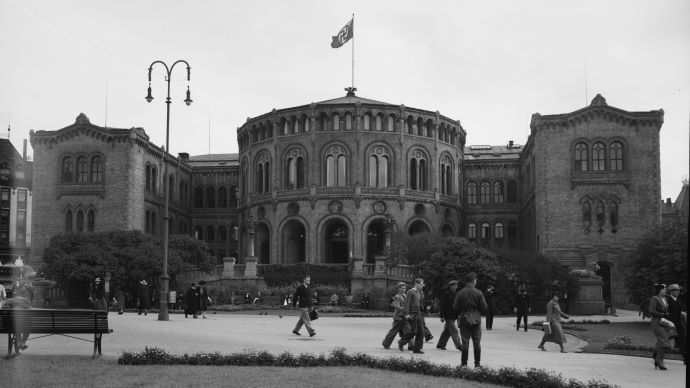 The norwegian Parliament with the naziflag. Black and white photo.