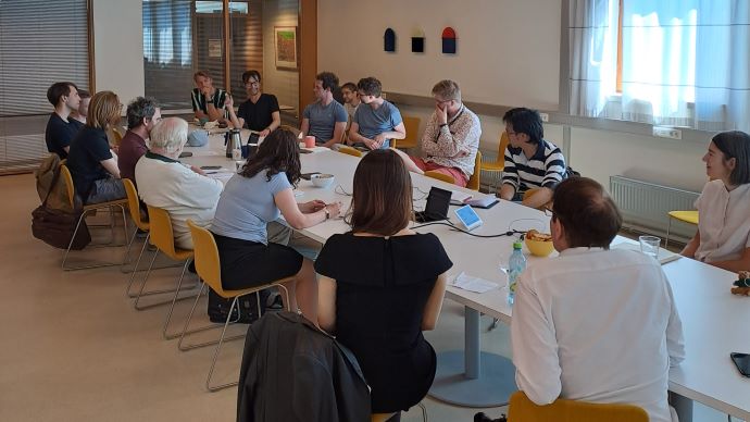 Group of people in a meeting. Photo.