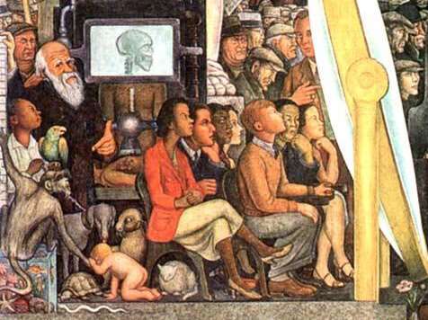  Utsnitt av et fargerikt veggmaleri av Diego Rivera. En gruppe mennesker i ulike aldre sitter tett sammen og ser oppmerksomt mot høyre. Blant dem er en eldre mann med langt, hvitt skjegg, flere barn og voksne, samt en hund, en katt og en papegøye. I bakgrunnen står flere mennesker, og en skjerm viser et bilde av et menneskehode i profil.