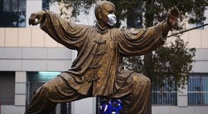 Facemasks on a male statue. 