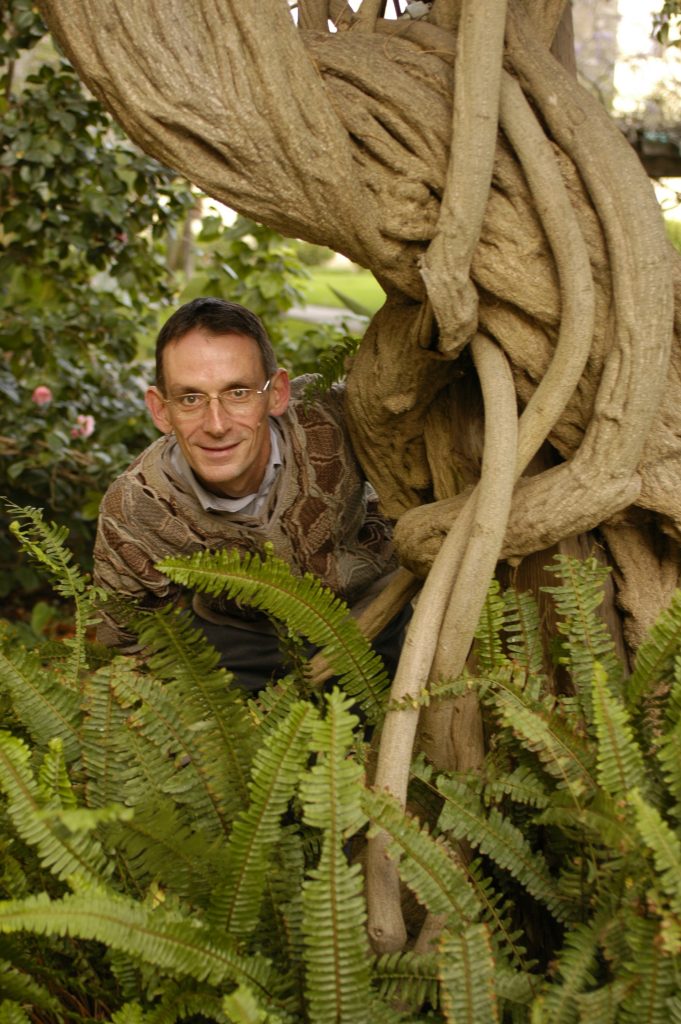 Geoffrey C. Bowker, peeking out under a tree.