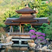 Image may contain: Gazebo, Japanese architecture, Pond, Architecture, Chinese architecture.