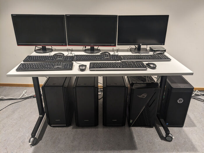 table, machines, screens