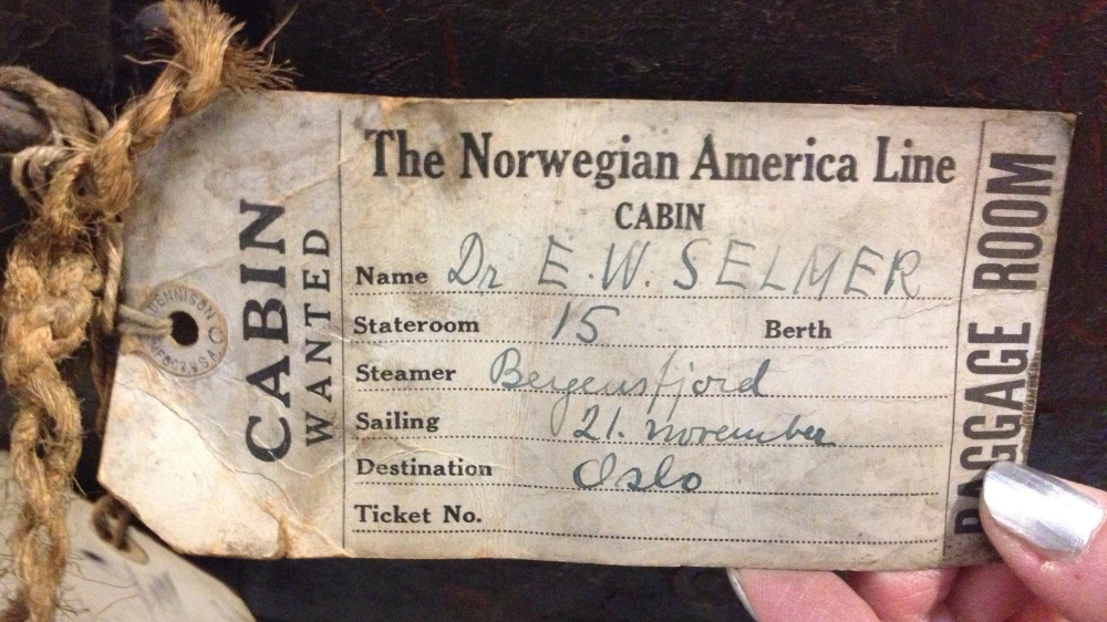 Old luggage tag with writings